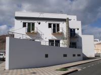 Nautilus Apartments in the Canary Islands take their shape from the bow of a ship to make best use of their corner site.