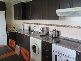 The kitchen area of the high quality house to let