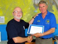 Padi certificate of excellence awarded by PADI Regional Manager Christian Marret to Davy Jones Diving
